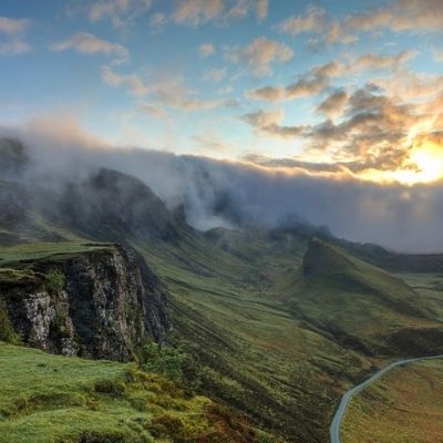 A beautiful landscape with a setting sun.